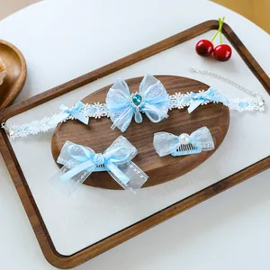 Blue lace pet accessory set with bow collar, rose hair clip, and pearl comb