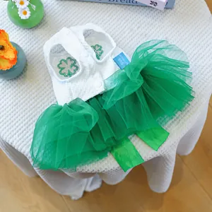 Detail of green St. Patrick's clover embroidery on a layered pet tulle dress