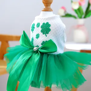 Detail of St. Patrick's Day pet tutu dress featuring shamrock embroidery and mesh skirt