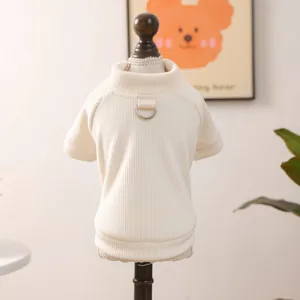 Cream knit pet sweater with leash D-ring for small dogs and cats on a wooden mannequin