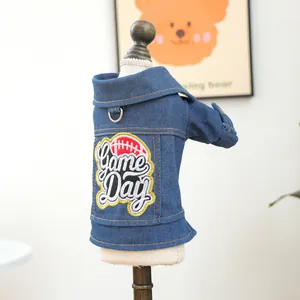 Detail of pet denim jacket with Game Day embroidery and metal D-ring for leash attachment