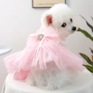 Pink pet wedding dress with multilayered tulle skirt and large bow for small dogs