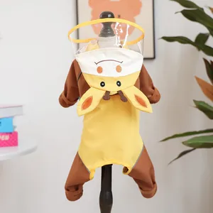 Detail view of yellow giraffe dog raincoat with waterproof PVC hood and cute cartoon ears