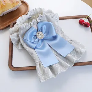 Lace pet dog dress with a large blue satin bow and rhinestone for small dogs