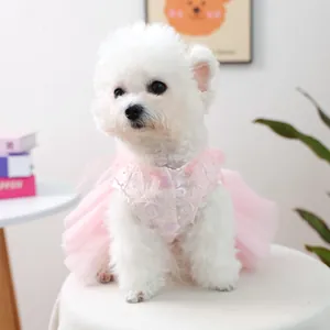 Detailed view of pink pet princess dress with delicate floral lace and layered tulle skirt
