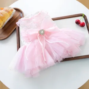 Pink lace pet dress with fluffy mesh skirt and pearl heart bow for small dogs