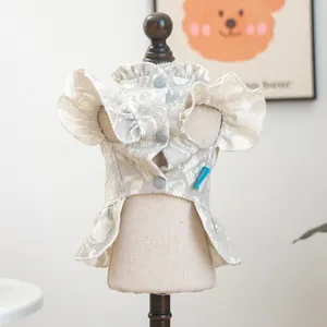 Pet lace dress featuring ruffled collars, three front buttons, and soft floral textures