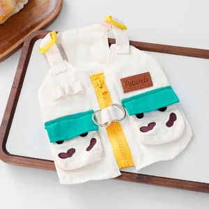 Workwear pet vest with zipper and green pockets on wooden tray for small dogs
