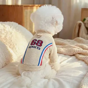 Detail of pet sweatshirt with 68 sports embroidery and built-in D-ring for leash attachment