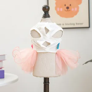 Detailed back view of pink mesh pet tutu dress with white top and button closures