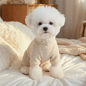 Close-up of beige ribbed knit pet sweater for small dogs with soft textured fabric