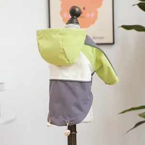 Detail of color-block pet windbreaker with adjustable drawstring hem for small dogs