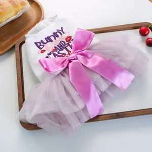 Detail of Easter pet dress with 'BUNNY kisses' embroidery and purple tulle skirt
