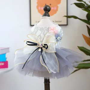 Detail of grey pet wedding dress with lace bodice, mesh tutu skirt and crown pendant bow