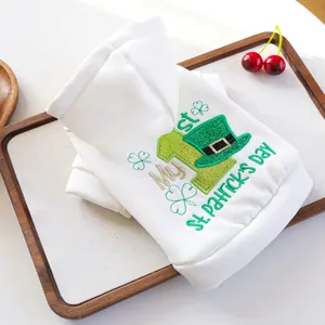 Detail of My 1st St. Patrick's Day embroidery on soft white cotton pet hoodie