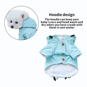 Waterproof light blue hooded dog raincoat with adjustable drawstring and metal snap buttons