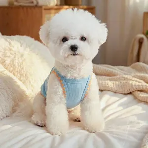 Light blue ribbed knit pet vest with orange wavy trim for small dogs and cats