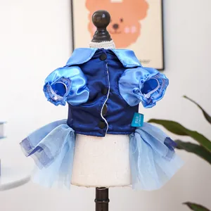 Close-up of royal blue dog tutu dress with puffy sleeves and layered light blue tulle skirt