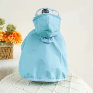 Waterproof light blue pet raincoat with a transparent hood visor shown from a back view