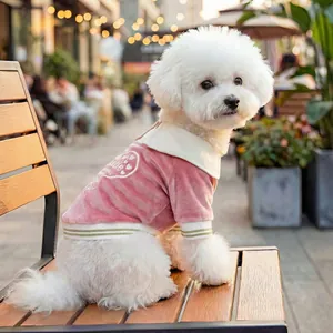 Pink velvet pet polo shirt for small dogs with heart embroidery and striped cuffs