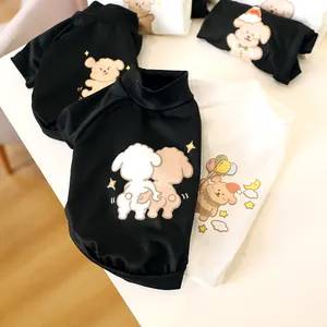 Detailed close-up of soft cotton pet sweatshirts with cute cartoon puppy illustrations