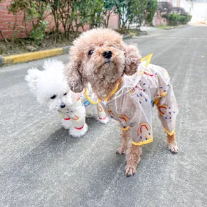 Detail of waterproof dog raincoat with rainbow print and protective yellow trim
