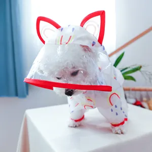 Detail of dog raincoat with rainbow print, cat-ear hood and transparent TPU face shield