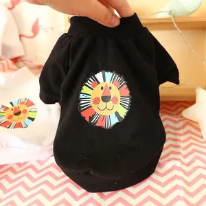 Close-up of black pet t-shirt with a colorful cartoon lion print in soft cotton