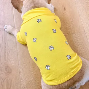 Détail du polo pour chien jaune citron avec des imprimés de bouledogue français