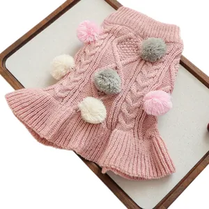 Pink knit pet sweater dress with colorful pom-poms and pleated skirt for dogs and cats