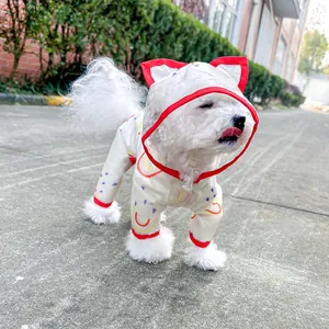 Detail of pet raincoat featuring a hood with cat ears and transparent PVC visor