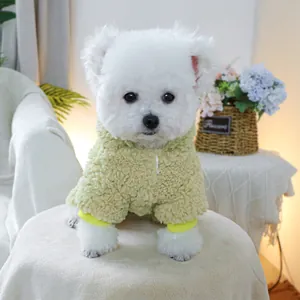 Close-up of thick light green fleece dog sweater with yellow ribbed cuffs for small pets
