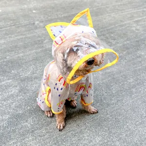 Close-up of clear pet raincoat with rainbow print, yellow trim, and cat ear hood detail