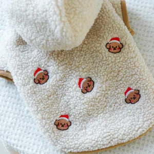 Detailed view of warm sherpa fleece pet hoodie with festive Christmas dog embroidery