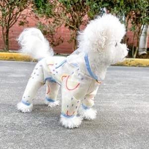 Detail view of pet rainbow raincoat with waterproof four-leg design and clear hood