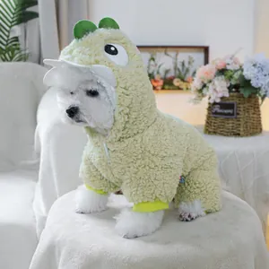 Close-up of green lamb wool dog onesie with dinosaur hood and yellow ribbed cuffs