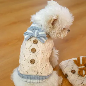 Detail of dog knit sweater featuring hollow diamond pattern and wooden buttons
