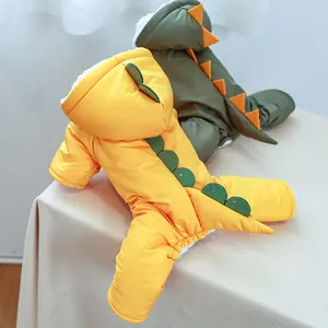 Detail of warm dinosaur pet coat showing thick fleece lining and colorful spine ridges