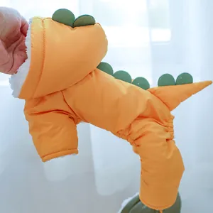 Detail of yellow dinosaur pet coat with windproof shell and soft white fleece lining