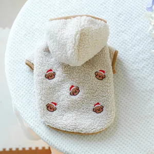 Warm beige fleece dog hoodie with festive bear embroidery and brown ribbed edges