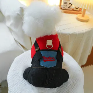 Detail of red pet sweater and black denim overalls with Boston embroidery for small dogs