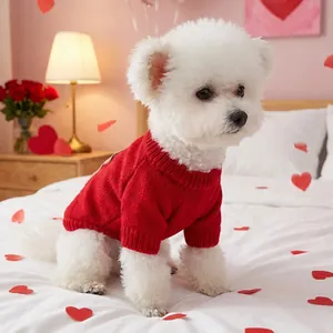 Red knit dog sweater for small pets featuring ribbed cuffs in a cozy bedroom scene