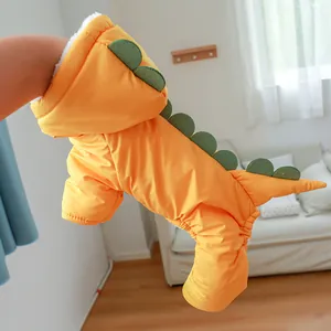 Detail of dog dinosaur coat showing warm white fleece lining and windproof yellow fabric