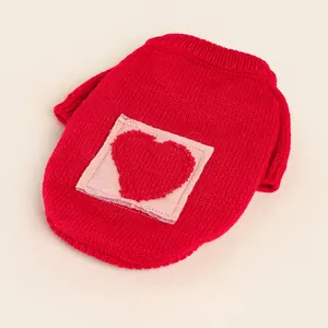 Red knit pet sweater with pink heart patch for small dogs and cats in autumn or winter