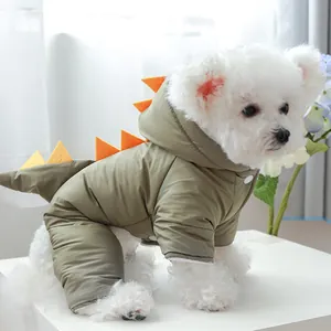 Detail of warm dinosaur themed pet jacket with green windproof fabric and soft fleece lining
