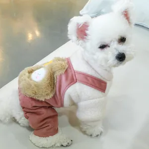 Detail of pink fleece pet overall with cute brown plush bear pocket for small dogs