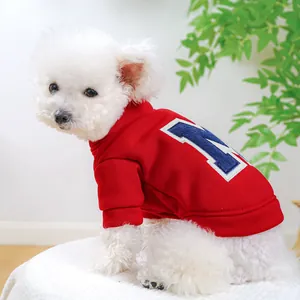 Detailed view of red warm dog hoodie with letter M embroidery and soft ribbed cuffs