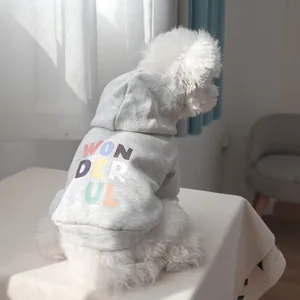 Detail of grey pet hoodie with colorful WONDERFUL print on soft cotton fabric