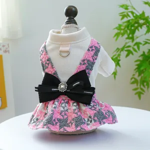 Classic houndstooth pet dress with bow and D-ring for dogs and cats in pink and white