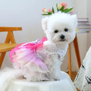 Detail of pink gradient pet dress with sequined embroidery and a satin bow